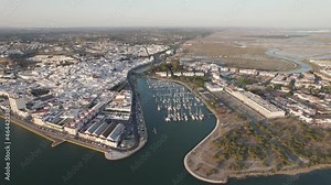 Ayamonte harbor and surrounding landscape, Andalusia in Spain. Aerial reverse ascendent