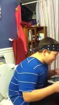 Boy forgets to pull his pants down
