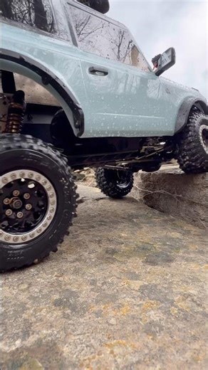 Climbing out of a waterfall with my Element Rc Ecto 21 Ford Bronco build