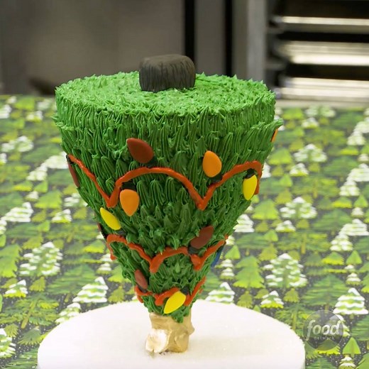 This Upside-Down Christmas Tree Cake defies the law of gravity! 🎄😱🎄 Incredible work, Sugar Monster Sweets! 👏 | Food Network