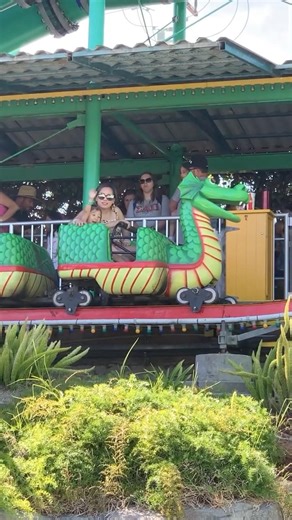 Riding a dragon roller coaster #fun #girl #rollercoaster