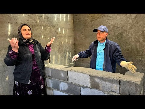 The operator and the homeless mother happily build the wall of their house of love