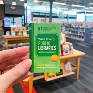 Have you seen our brand new library cards? They're available now at all of our 23 Wake County Public Libraries' locations! A couple questions we've received: ❓ Will my account history and details be transferred to my new card? 😀 Yes! Your card number will change, but everything else will stay the same. Your reading journey continues uninterrupted! ❓ Do I have to trade out my current card for a new one? 😀 No, you don't! You can keep your current card as long as you like. People who stop by for 