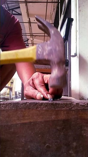 Nailing It Right: The Art of Hammering Nails with a Simple Hammer"