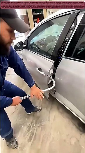 Door Repair of a Silver Car by a Technician