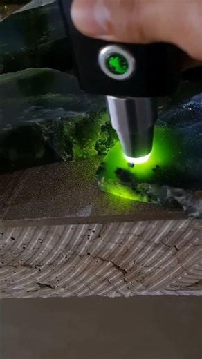 Nephrite jade displaying deep natural green tones and smooth mineral texture