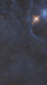 Take a journey through a triple-star system! Made up of the stars HP Tau, HP Tau G2, and HP Tau G3, this system is cocooned by a cloud of gas and dust that shines with the stars' reflected light. Hubble made these observations to learn more about protoplanetary disks, which are disks of material around stars that eventually form into new planets over the course of millions of years. HP Tau is found in the constellation Taurus, at a distance of about 550 light-years. Music credit: "Stellar Sirens