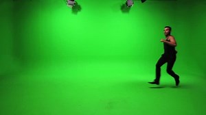 clip-3215965-man-running-stopping-green-screen-background-male