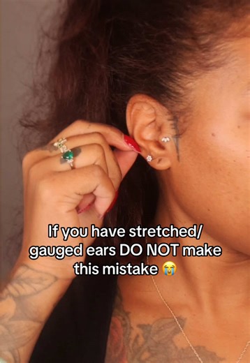 If you have stretched/gauged ears DON’T make this mistake 😭 Wait until your lobes are completely healed before wearing gauge weights, or heavy earrings through your tunnels 🫶🏾 #gauges #stretchedears #earstretching #womenwithgauges