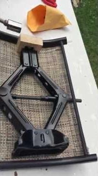 Replace your patio chair sling using a car jack as a spreader