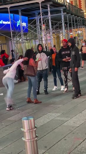 Girl's Wig Snatching Prank in Public