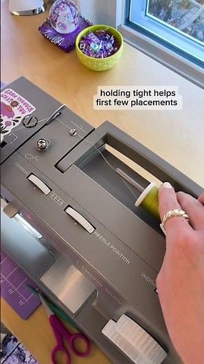 Thread a sewing machine