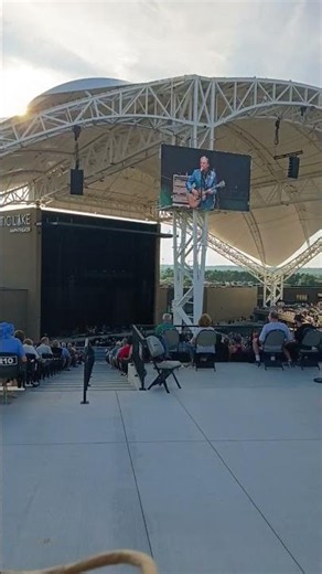 The John Doe Folk Trio preforming at Mystic Lake Amphitheatre