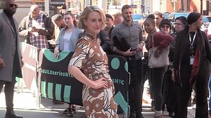 Golden Pumps! Taylor Schilling in floral dress and gold heels