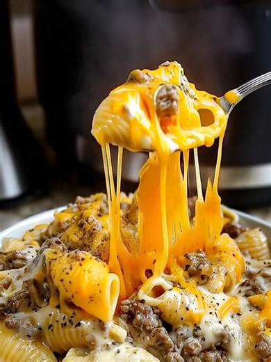 🍝 Crockpot Cheesy Ranch Beef Pasta Shells 🧀✨ This is the ultimate comfort food — creamy, cheesy, flavorful, and made effortlessly in your crockpot! Every bite is packed with tender pasta, seasoned beef, and that irresistible ranch flavor that makes it totally addictive 😋 💬 Get the Full Recipe 👇 (check c.o.m.m.e.n.t) 📌 Hashtags: #CrockpotRecipe #CheesyBeefPasta #ComfortFood #RanchPasta #EasyDinner #TastyToobo | Cooking Recipes