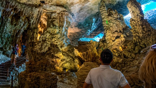 What can you see inside Sung Sot Cave?