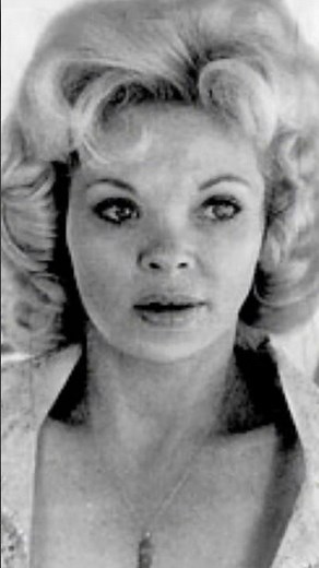 "Captivating Charm: Candy Barr's Sensational Performance in Vintage Burlesque Reel!"