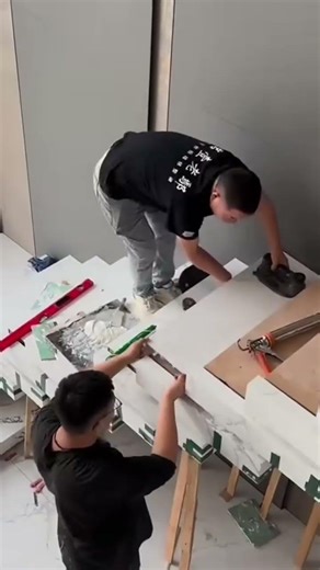 Ceramic tile installation process for stairs in grand buildings