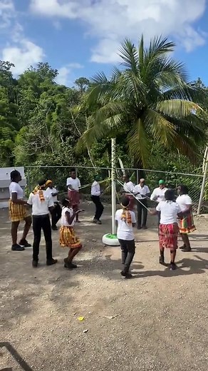 Maypole, also referred to as the Long Ribbon Pole in rural areas, was a part of outdoor social festivals of old England and Jamaica and was performed at fairs, garden parties or picnics. It involves the plaiting of different coloured ribbons demonstrating three basic traditional patterns starting with the grand chain or “basket weave” wrapping the ribbons around the pole from the top. There are various styles in Maypole, more popular being the Spider Web, Flair, Dome and Umbrella. #jamaicaday #m