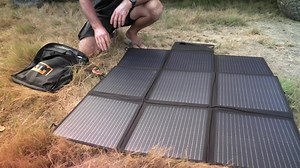 Heading off the beaten track? An XTM 200W Folding Solar Blanket is your ticket to portable power, allowing you to harness the sun's energy and stay powered up wherever you roam ☀ Not only is this blanket packed with features, it also packs up small, saving space in your four-wheel drive for the good stuff 🍻 Plus, it doesn't take a rocket scientist (or sparky) to work out. Jase from All 4 Adventure gives us the rundown on just how easy it is to use. | BCF - Boating, Camping, Fishing