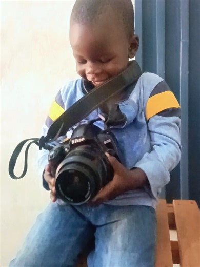 Youngest Photographer in Uganda : Omri Brashan JNR. Born for greatness. Have time to inspire your Children for a Legacy.