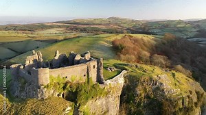 Aerial of Carreg Cennen Castle at dawn, Trapp, Brecon Beacons, Carmarthenshire, Wales, United Kingdom