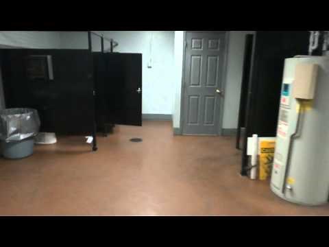 Locker room/Bathroom Tour: of the office with Eljer Urinal and toilet with American Standard Toilet