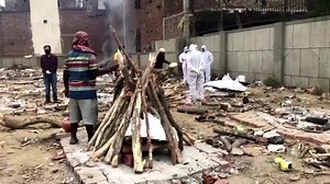 WARNING - GRAPHIC CONTENT: Bodies were found washed ashore in the River Ganges as India's coronavirus crisis continues to spiral and the death toll passes 250,000 | Reuters