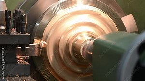 The lathe machine rough cut the brass material parts by lathe tools.