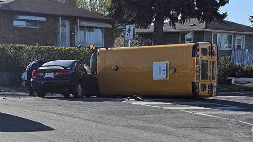 School bus tips onto side after crash in SE Calgary, minor injuries