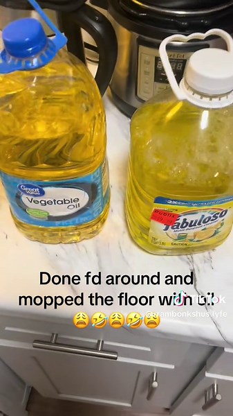 Slippery Floor Mishap: Oil Mopping Fail