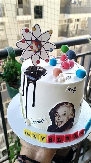 science themed cake with all edible handcrafted toppers
