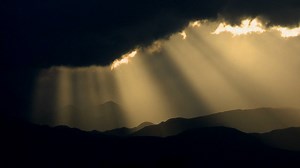 Time lapse of sun rays through the clouds  - Free Stock Video