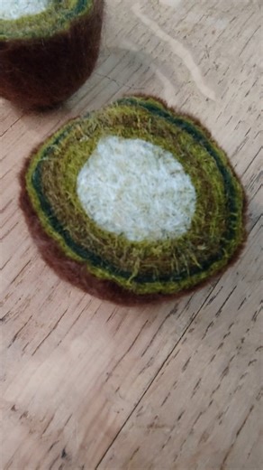 Beginners needle felting | Textile sculpture | Fabric art on Instagram: "This was so cool, working with layers of needle felt you never know what you're going to get until you cut it open. I'm creating a new needle felt tutorial looking at wool types and needles. Inspired by a kiwi! 🥝 #needlefelting #feltingtutorials #mixedmediaart #kiwi #fiberart"