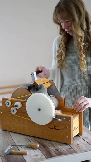Claudia -Cedar Hill Fiber Farm on Instagram: "Although not typical, sometimes I only need an ounce or two of a fiber carded, in which case it is easier to bring out the mini carder. The carding cloth is 72 tpi, so it is better for the sturdier fibers as opposed to fine wools. Apart from the hand crank it functions much like our motorized carder, just on a much smaller scale.💗"