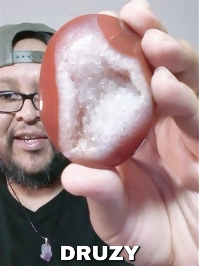 Druzy Carnelian palm stone showing gorgeous bright orange tones and a striking centered druzy 🧡✨ #crystalvideo #carnelianstone #stonelovers
