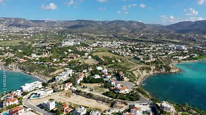 Aerial panoramic view of Coral bay beach, Cyprus. Overhead view of Coral Bay beach, Peyia village, Paphos district, Cyprus. Aerial view of Coral Bay beach in Peyia village, Cyprus.