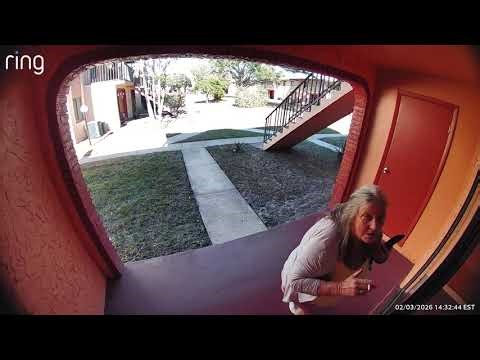 February 3rd 2026 at 1431 hours neighbor peeps through sliding glass window.