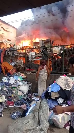 Large Outdoor Fire Engulfs Pile of Clothes