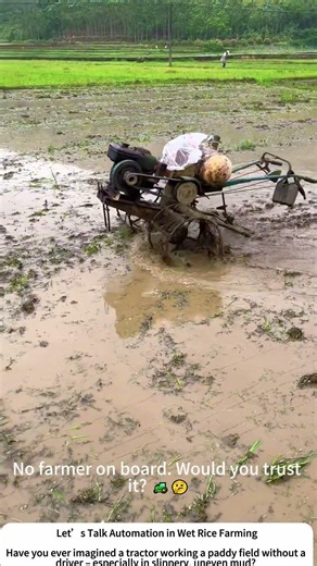 Autonomous Hand Tractor Plowing a Muddy Paddy – Driverless Field Work