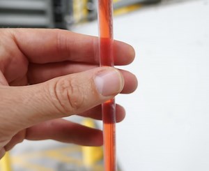 Trying to drink from the world's longest straw