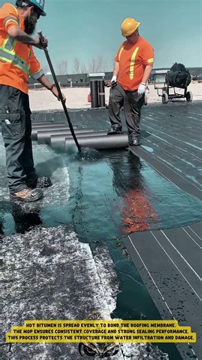 Applying Hot Bitumen using Roofing Mop to Install Waterproof Membrane