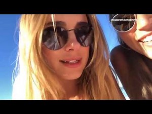 Kimberley Garner flaunts figure in barely there blue bikini.