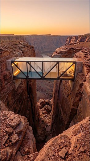 We turned two canyon cliffs into a glass bridge home.