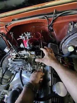 Edelbrock TV cable bracket to aid in cable geometry for a 700r4 or similar