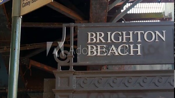 New York City Brighton Beach elevated subway, metro entrance sign, Brooklyn, United States. American underground transport. Metropolitan station near Coney Island, NYC USA. Russian immigrant district.