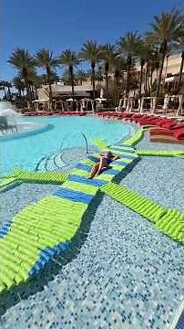 It loves swimming 🙂‍↕️🦎 #craft #diy taking my giant 40 ft pool noodle lizard swimming