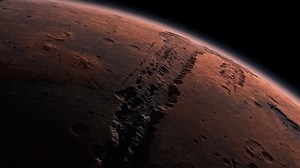 clip-1051598890-mars-planet-rotating-outer-space-orbiting-traveling