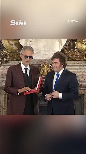 Awkward moment Argentinian president tries to shake Andrea Bocelli's hand