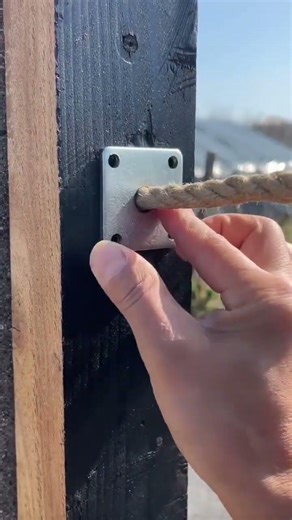 the process of making a clothesline using rope attached to the wall #construction #popular #shorts